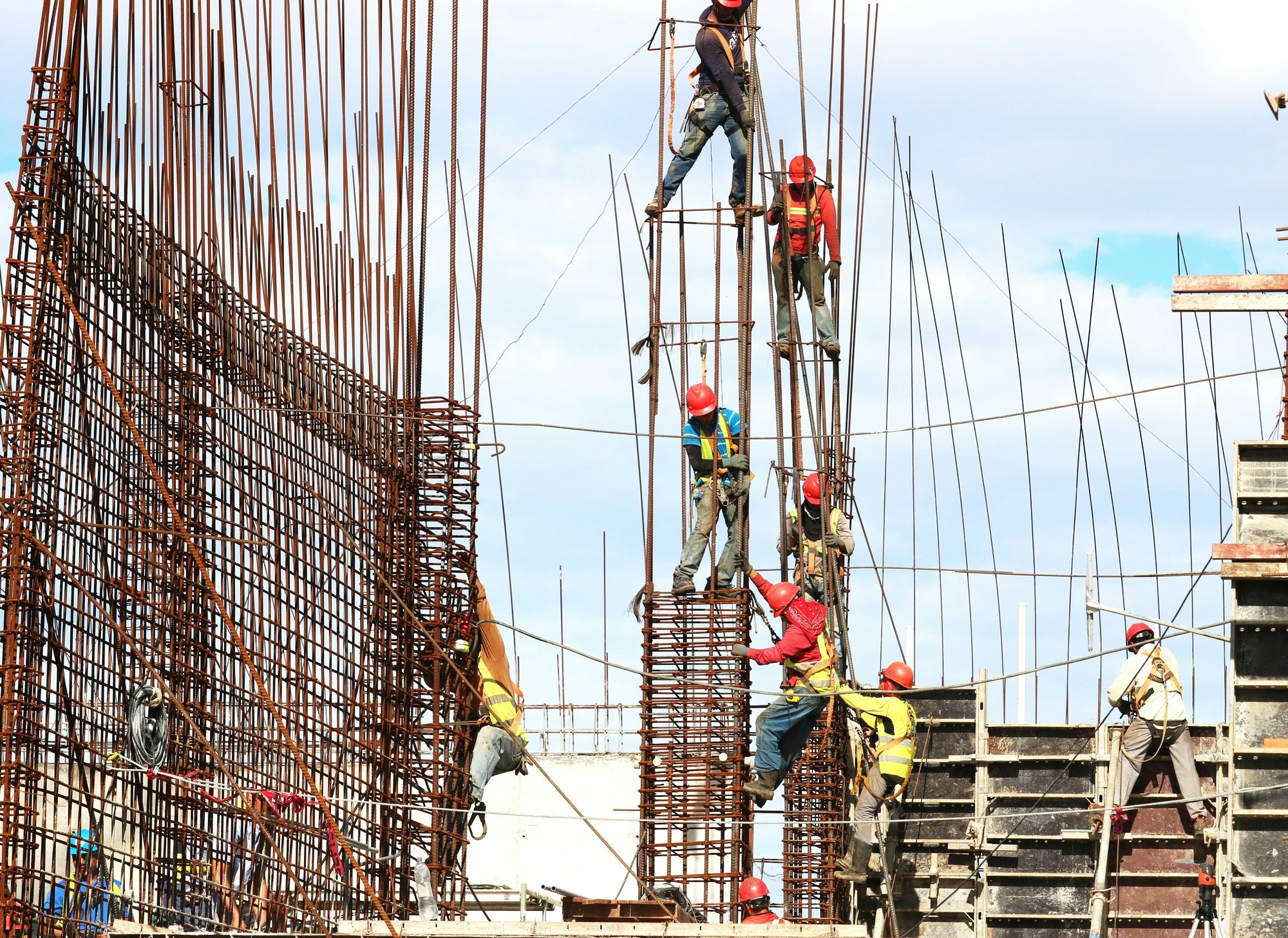 men working on industrial construction